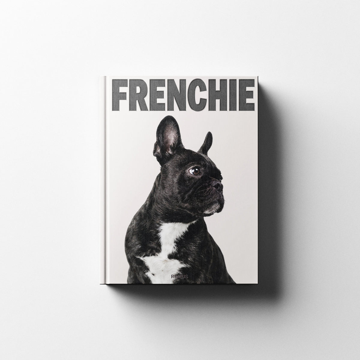 French Bulldog book cover in ivory linen — REMUS Collection coffee table book