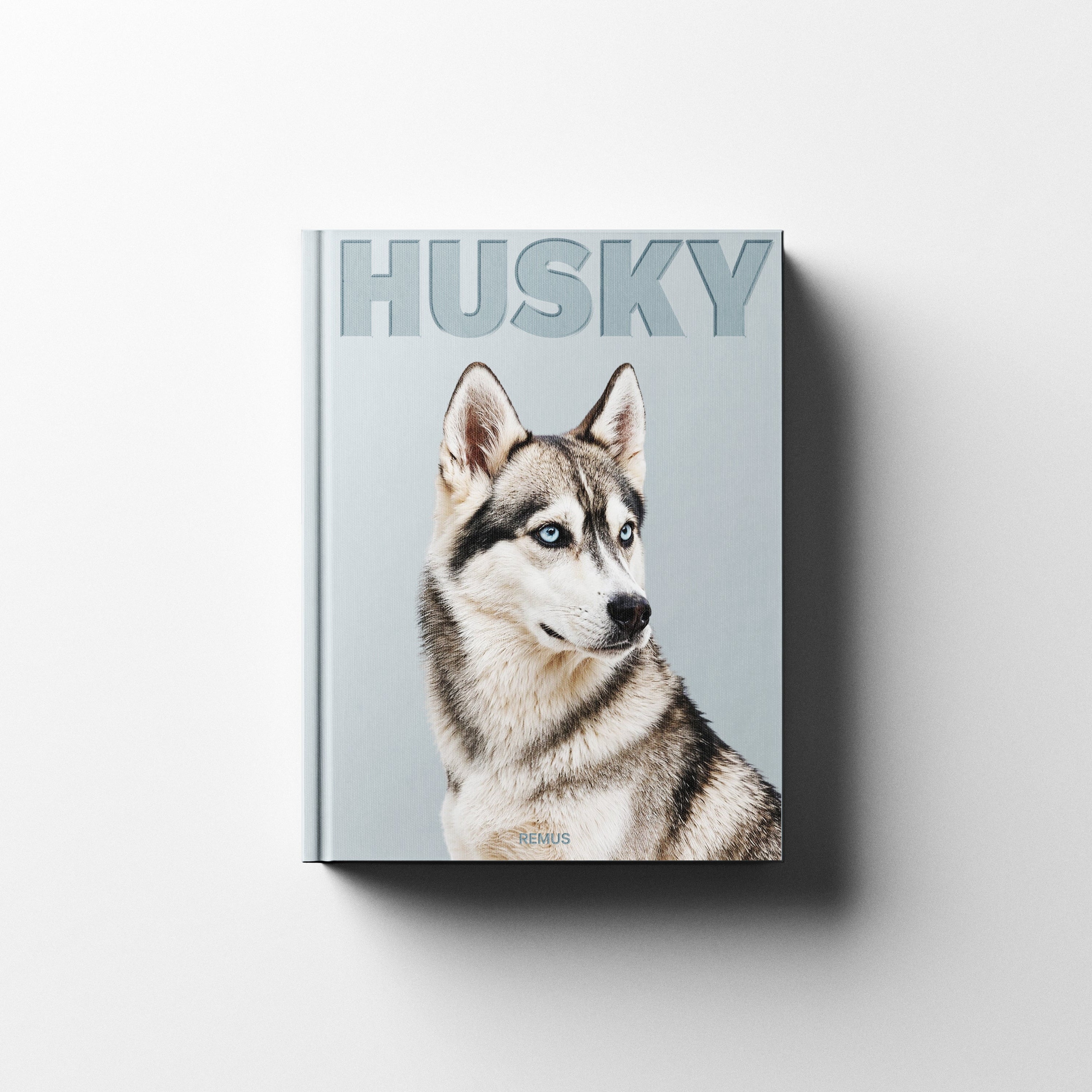 Siberian Husky book cover in glacier blue linen — REMUS Collection coffee table book